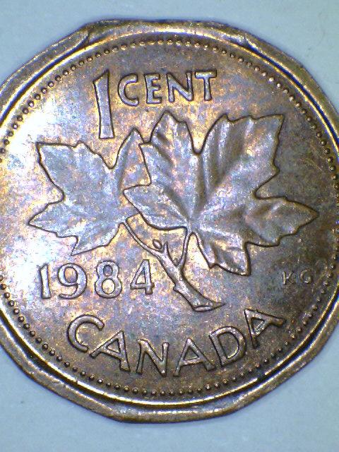 NY-First-12-Sided-Canadian-Cent-Clip